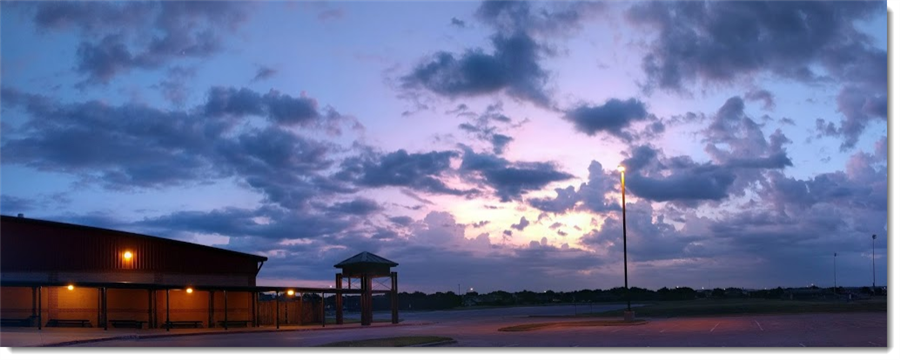 Photo of sun rising at Bastrop Middle School 